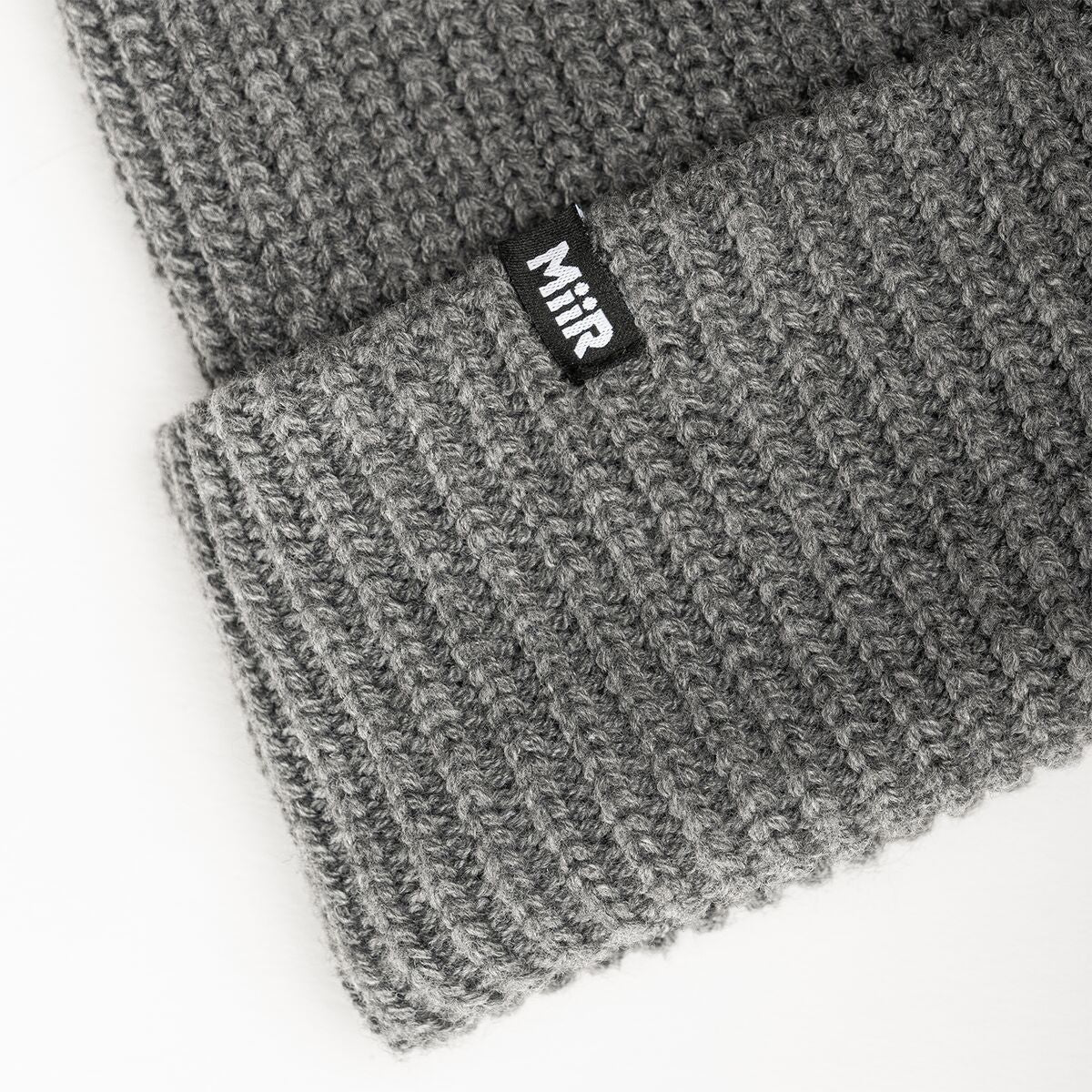 jodie-williams-beanie-d2 WebPDP-RecycledPolyRibBeanie_Studio_TagDetail_GrayHeather__BNE002400OS.jpg